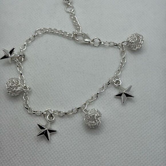 Brand New!! Sterling silver bracelet with stars and wire sphere - Picture 1 of 4